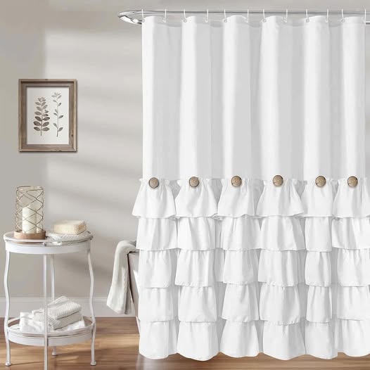 This ruffle shower curtain is dropping 50% off