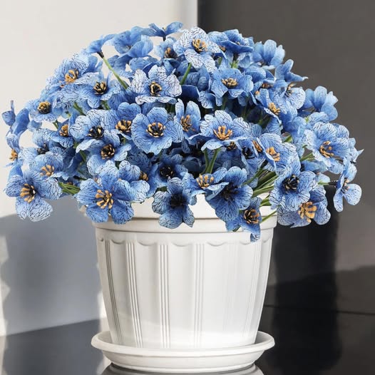 This 16-piece set of UV-resistant outdoor flowers is so pretty 40% off