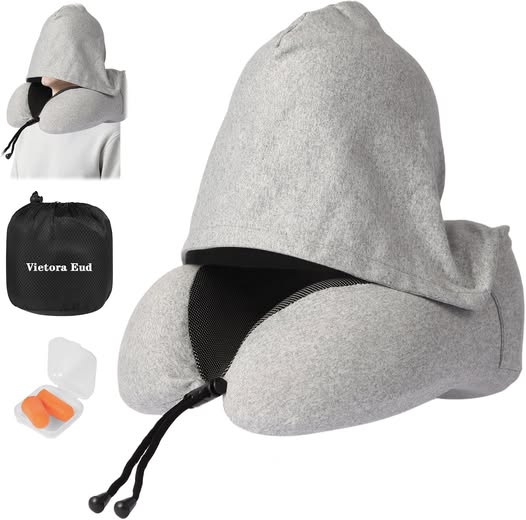 This Travel Neck Pillow with Light-Blocking Hood is 50% off