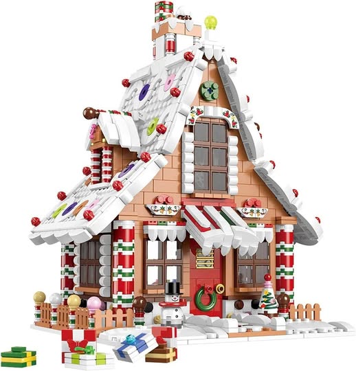 Oh I LOVE THIS!!!!! This Gingerbread House Building Set drops 50%off