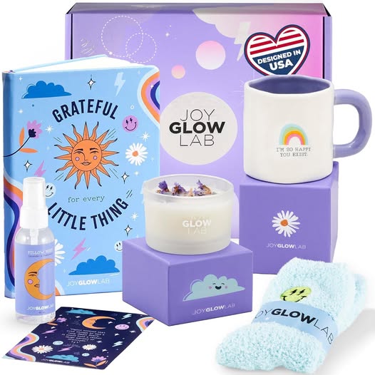 This lavender-themed self-care gift box comes with socks, a candle, journal, mug, pillow mist