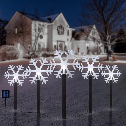 These Snowflake Solar Christmas Pathway Lights are 50% off