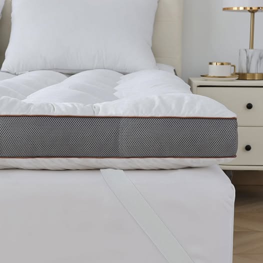 This 4-Inch Memory Foam Mattress Topper is 50% off