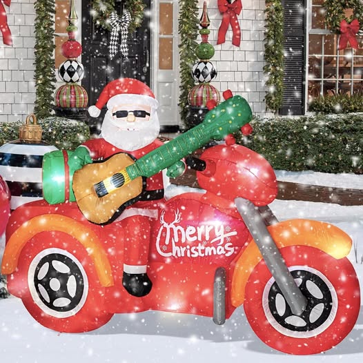 Inflatable Santa on motorcycle fun and unique holiday yard décor.